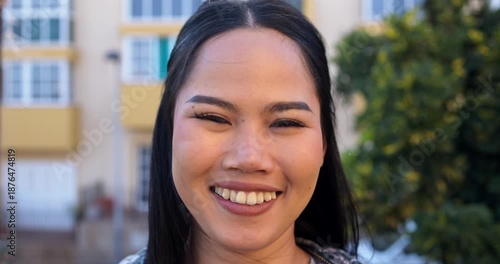 Happy east asian girl smiling on camera outdoor - Lifestyle concept 