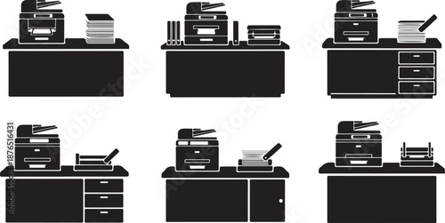 Office desks with various office equipment and printers displayed