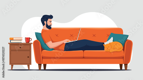 Young man relaxing on an orange sofa while working on a laptop with a ginger cat sleeping at his feet in a cozy living room environment.