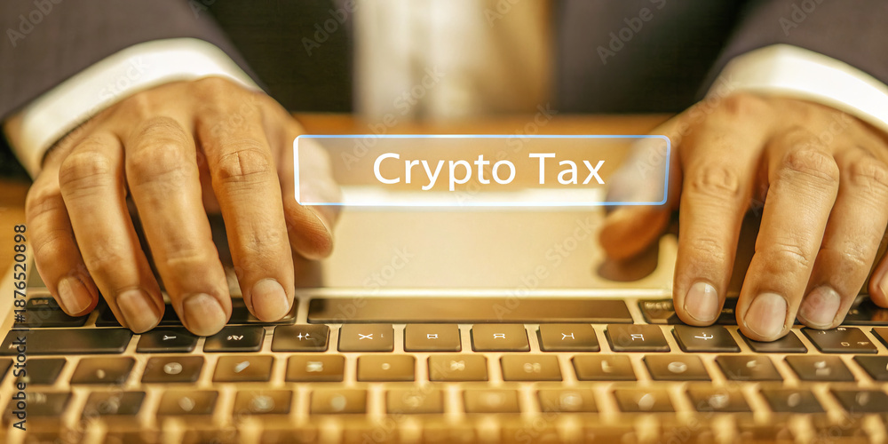 custom made wallpaper toronto digitalClose up of professional hands in suit typing on laptop keyboard with words crypto tax highlighted, representing finance, technology, and digital currency concepts