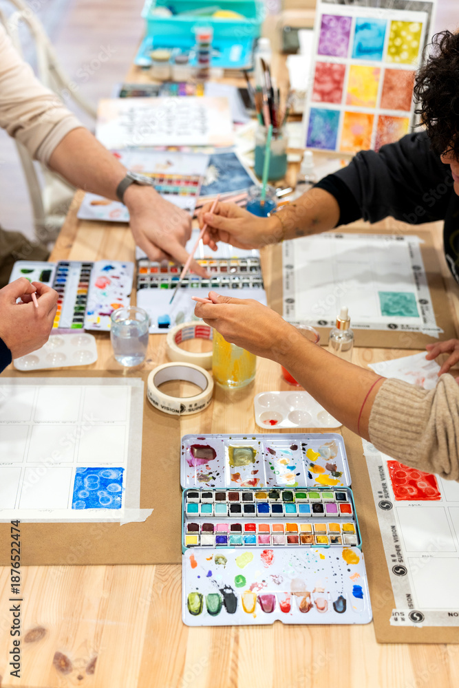 Fototapeta premium People taking adult watercolor painting class learning art techniques