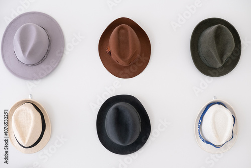 hats on a white background, six hats hang
