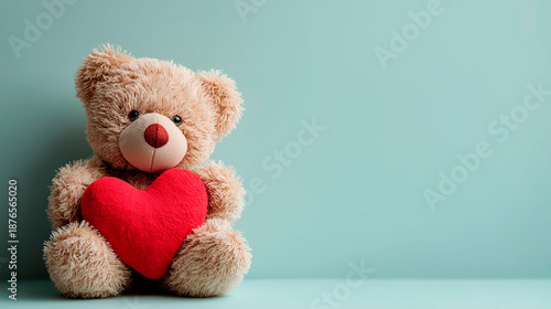 Cute Teddy Bear Holding Red Heart on Mint Green Background