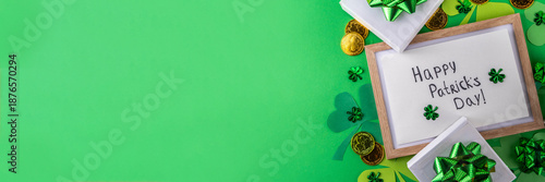 Wallpaper Mural Shamrock saint patrick's day bright high-colored background, St. Patrick's holiday flatlay with party gift boxes, decor, shamrock and gold coins on green background Torontodigital.ca