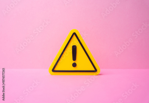 Bild auf Leinwand Warning sign on a pink background