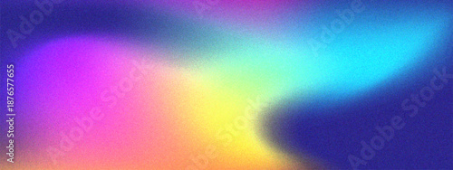 Blurred abstract background with vibrant pink yellow and blue hues