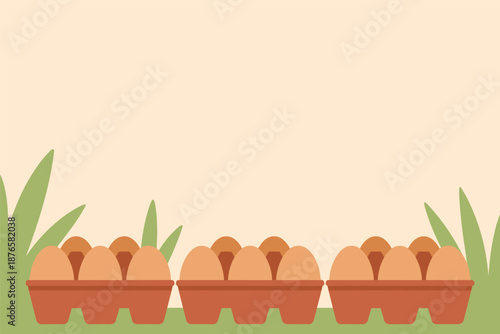Brown Eggs in Cartons on Green Grass, free range eggs concept with copy space