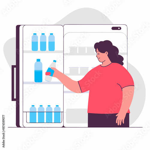 Woman grabbing a cold bottled drink from the refrigerator