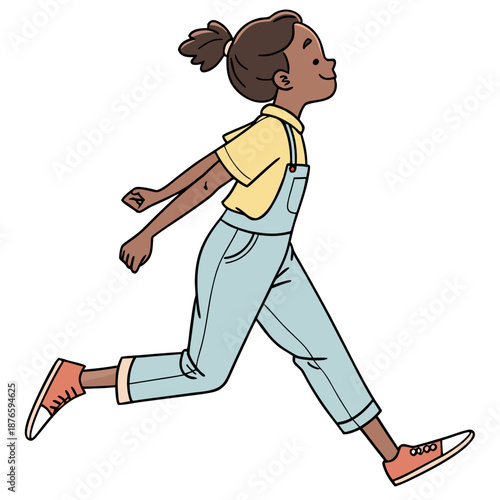 Young girl running in overalls with joyful expression
