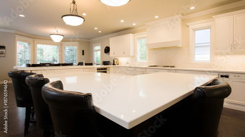 cabinetry. Modern kitchen interior with clean contemporary cabinetry and appliances in a spacious layout. real-estate listings.