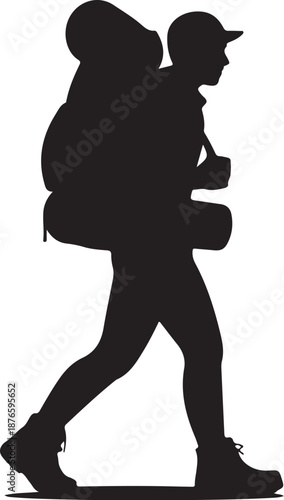 Silhouette of a hiker carrying a large backpack and walking