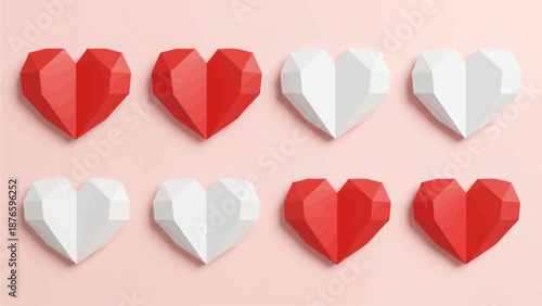 Arrangement of red and white paper hearts on a pastel pink background