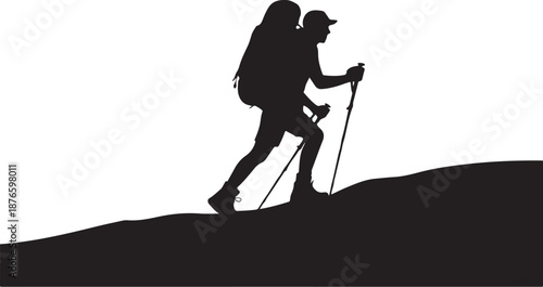 Silhouette of a Hiker with Trekking Poles on a Hill