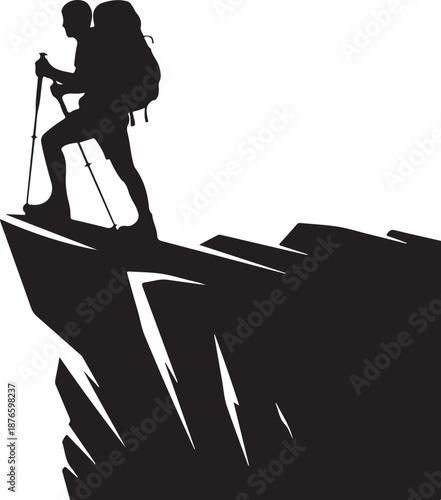 Silhouette of a hiker with trekking poles on a mountain ridge