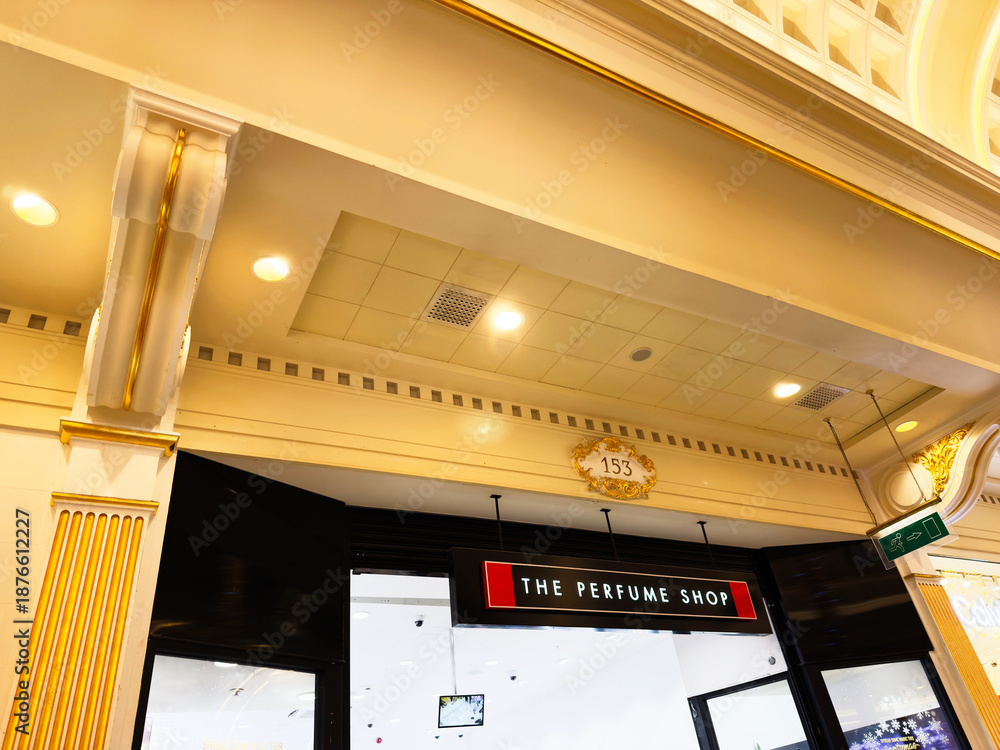 Obraz premium Luxurious Manchester perfume shop entrance with ornate gold detailing and modern signage