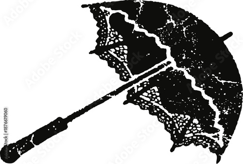 Victorian lace parasol with intricate floral patterns and curved wooden handle