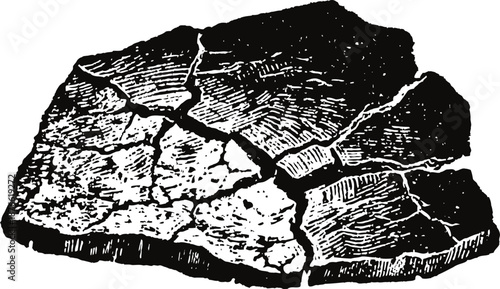 Ancient broken pottery shard with visible cracks and engraved texture fragment