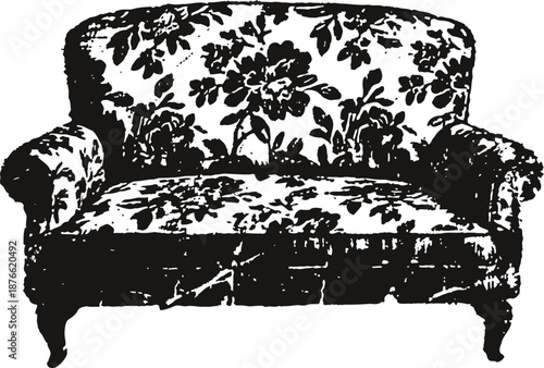 Vintage floral patterned sofa with curved armrests and wooden legs in black and white