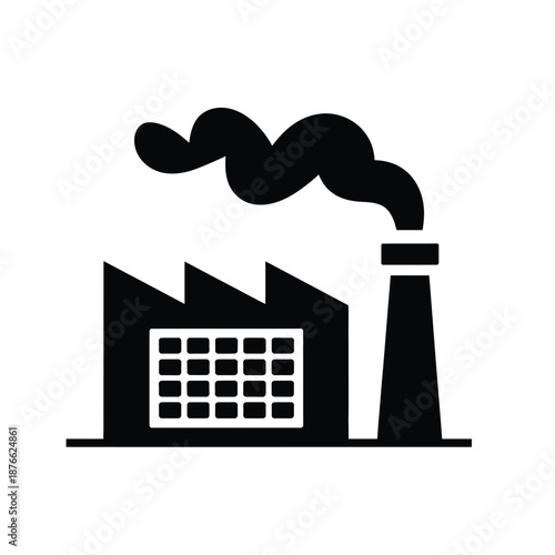 factory building with smoke coming out of chimney