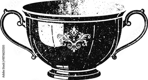 Vintage ornate trophy cup with decorative handles and intricate floral emblem design