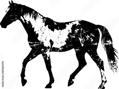 Black and white distressed silhouette of a walking horse with textured vintage effect