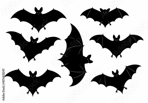 Collection of cute black bat silhouettes in various flying poses, perfect for Halloween, animal, or nocturnal themes on a white background.
