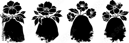 Silhouette of wildflowers in grunge artistic floral design with textured paint splashes and leaf details