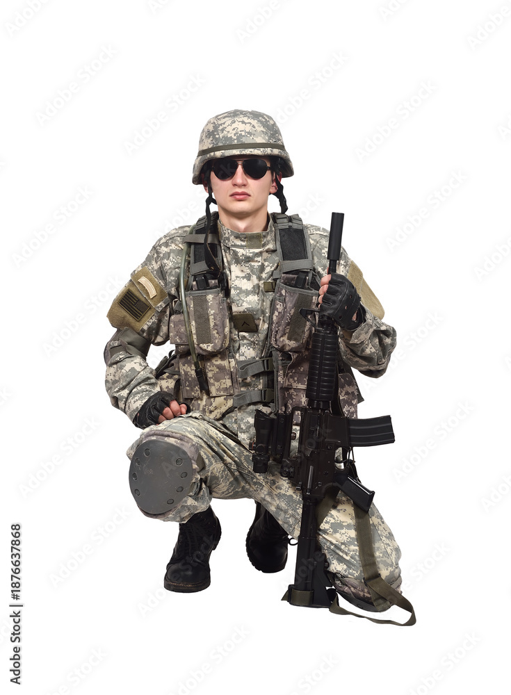 Fototapeta premium Armed soldier in full combat gear standing