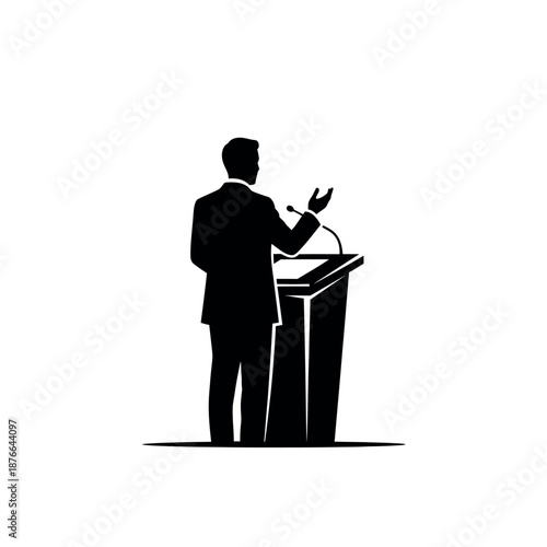 Silhouette of a speaker at a podium delivering a speech.