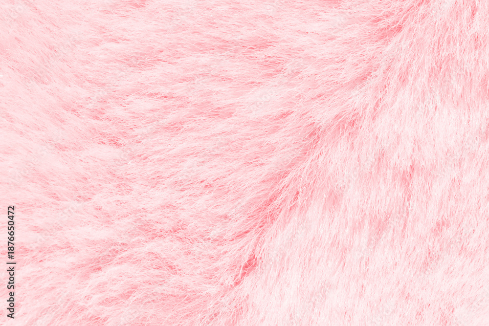 Obraz premium Soft pink fluffy texture close-up of plush surface for cozy and warm design elements.