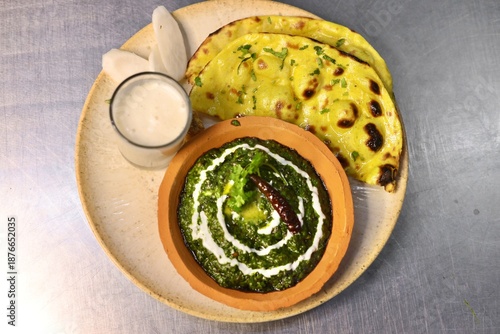 Tableau sur toile Makke ki roti sarso ka saag with buttermilk garnished with cream and butter