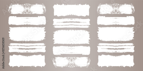 Vector paint brush set. White ink grunge brush strokes. Grunge design elements. Painted ink stripes. Creative isolated spots. Ink smudge, abstract shape stains and smear set