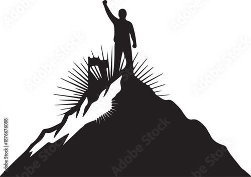Man standing on mountain peak with raised arm in triumph and celebration gesture