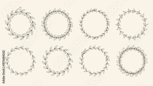 Set of eight diverse hand-drawn leafy laurel wreaths and circular floral frames for logos or decorations on cream background.