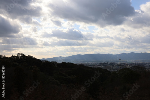 Overview of Kyoto City afternoon, with beautiful sunshine through the clouds.
