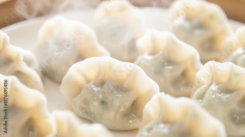 Close up of steaming fresh handmade dumplings in steamer