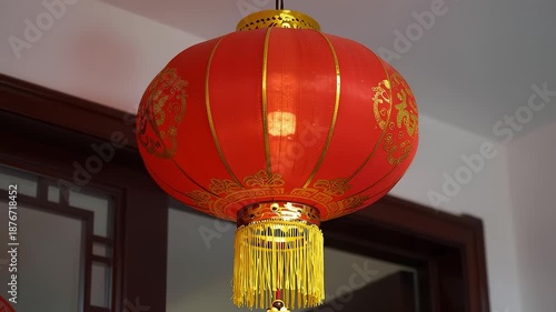 Exquisite red Chinese lantern hanging in traditional room