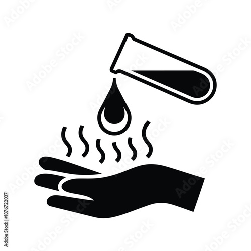 a hand receiving a drop of liquid from a test tube