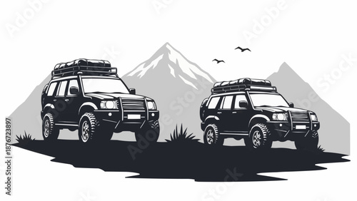 Two off road vehicles parked in front of mountains.