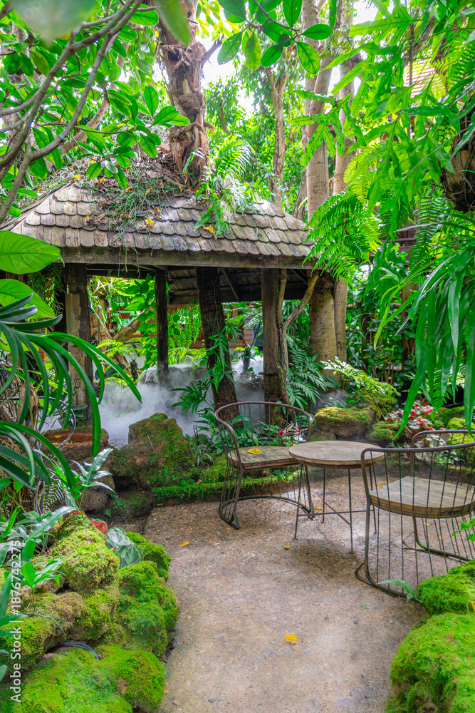 Naklejka premium beautiful garden in the courtyard of a restaurant in Thailand