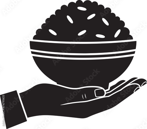 Hand holding rice silhouette in bowl with chopsticks