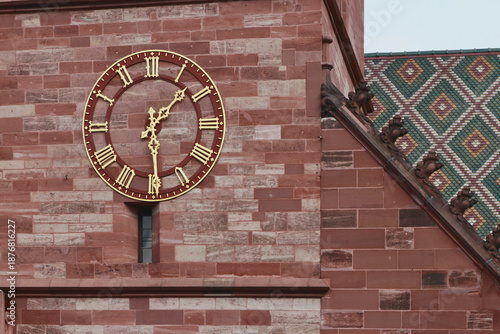 Mechanical clock on tower of cathedral. Basel, Switzerland
