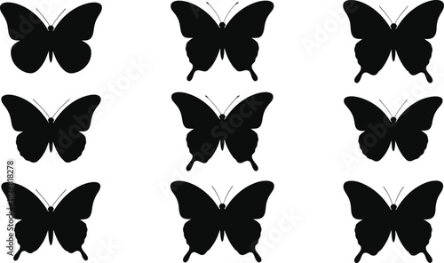 Silhouettes of butterflies in a row on white background