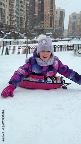 little girl playing in snow