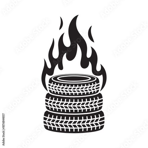 Stack of tires on fire with flames rising