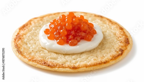 Russian blini with red caviar and crme frache on white background, traditional gourmet pancake appetizer