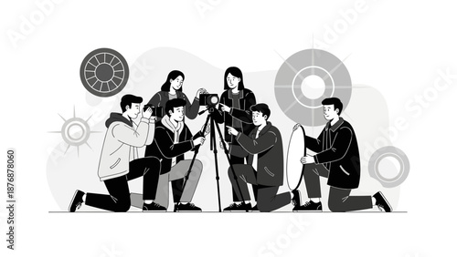 Engaged Photography Team Posing with Camera Equipment in a Studio Setting