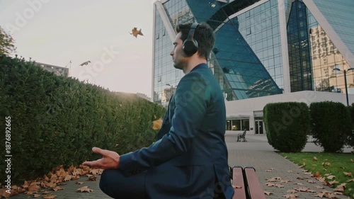 Meditation in the city: Finding peace amidst the autumn leaves and towering buildings