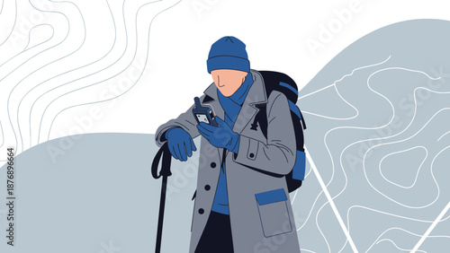Man Checking Coordinates In Winter Scenery With Backpack And Hiking Stick