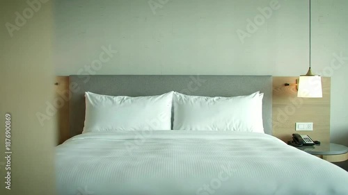 Modern Hotel Room, Cozy Bed, Urban Setting, Photo, Minimalist Design, Indoor, Relaxation Concept